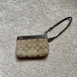 Small brown signature Coach wristlet/wallet